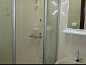 Апартаменты Slavka - free parking & BBQ: SA1(2), SA2(2+1), SA3(3), A4(4+1) Трибунь - Шибеник Ривьера  - ванная комната с туалетом