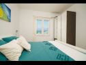 Апартаменты Slava - cosy apartments for 2 person: A5 - crni (2), A4 - zeleni (2) Водице - Шибеник Ривьера  - Апартамент - A4 - zeleni (2): спальная комната