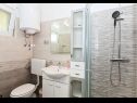 Апартаменты Snježa - green house: A1 Andelija(5), B2 Snjezana(4+1) Водице - Шибеник Ривьера  - Апартамент - A1 Andelija(5): ванная комната с туалетом