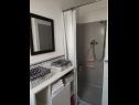 Апартаменты Bionda - seafront : SA1(2+1), A2(4+1) Жаборич - Шибеник Ривьера  - Апартамент - A2(4+1): ванная комната с туалетом