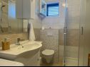 Апартаменты Željko - affordable and with sea view A1(5) Маслиница - Остров Шолта  - Апартамент - A1(5): ванная комната с туалетом