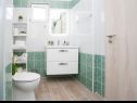 Апартаменты Tatja - 2 bedroom apartment: A1(4+1) Нечуям - Остров Шолта  - Апартамент - A1(4+1): ванная комната с туалетом
