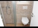Апартаменты Niko - modern: SA1(2), A2(2+2), A3(2+2), A4(4+2) Каштель Лукшич - Ривьера Сплит  - Апартамент - A3(2+2): ванная комната с туалетом