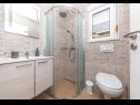Апартаменты Niko - modern: SA1(2), A2(2+2), A3(2+2), A4(4+2) Каштель Лукшич - Ривьера Сплит  - Апартамент - A3(2+2): ванная комната с туалетом