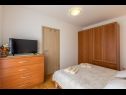 Апартаменты Neda - charming and comfy : A1(3) Сплит - Ривьера Сплит  - Апартамент - A1(3): спальная комната