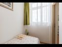 Апартаменты Neda - charming and comfy : A1(3) Сплит - Ривьера Сплит  - Апартамент - A1(3): спальная комната