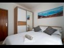 Апартаменты Lux 1 - heated pool: A1(4), A4(4) Марина - Ривьера Трогир  - Апартамент - A1(4): спальная комната
