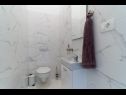 Апартаменты Lux 2 - heated pool: A2(4+2), A3(4+2) Марина - Ривьера Трогир  - Апартамент - A3(4+2): ванная комната с туалетом