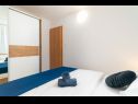 Апартаменты Lux 3 - heated pool: A5(4+2), A6(4+2) Марина - Ривьера Трогир  - Апартамент - A5(4+2): спальная комната