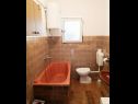 Апартаменты Ivan  - 15 m from beach: A1(7), SA2(2), A3(2+1) Винишче - Ривьера Трогир  - Апартамент - A1(7): ванная комната с туалетом