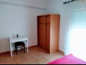 Апартаменты и комнаты  Aleksandra - 10 m from sea: A1 lijevi(2+2), A2 desni(2+2), A3(4+1), A4(2+2), R7(2), A5(4), A6(4+1) Бибинье - Задар Ривьера  - Апартамент - A3(4+1): спальная комната