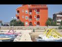 Апартаменты Sor - on the beach: SA1(2+1), A1(4+1), A2(2+2), A3(2+2) Бибинье - Задар Ривьера  - дом